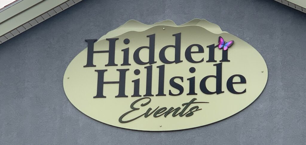 Hidden Hillside Sign
